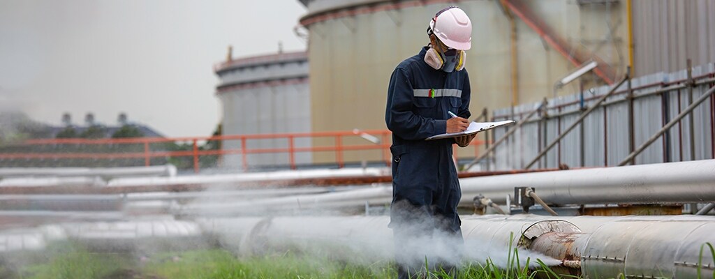 worker-inspection-at-steel-long-pipes